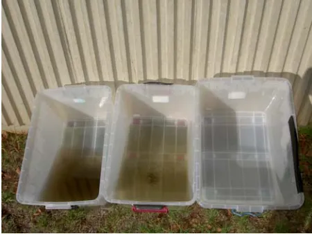 Figure 2 showing roof sampler. Flow from roof gutter [A] is screened [B] to remove debris and directed to the flow splitter which is housed in a 