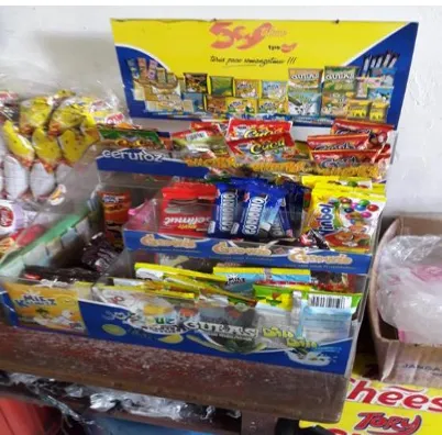 Figure 7: a range of snack foods displayed for sale at a school canteen. 