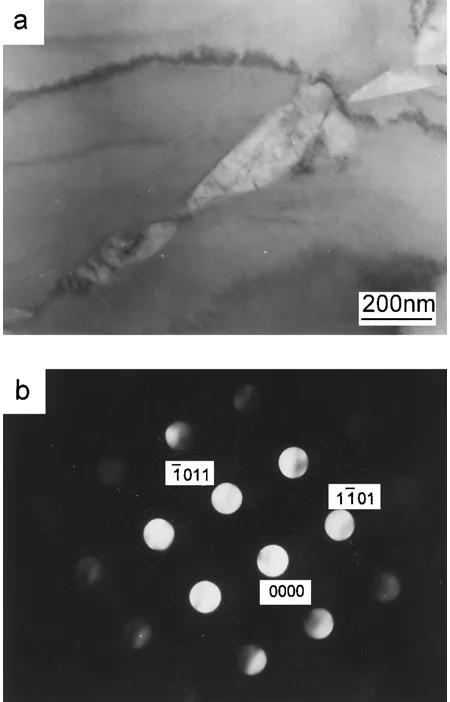 Fig. 7Bright ﬁeld TEM micrograph (a) and ⟨1231¯⟩α SAD pattern (b) ofTi–39Nb–13Ta–4.6Zr quenched and then aged at 500◦C for twelve days.