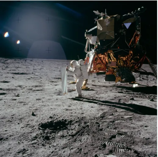 Fig. 9 Astronaut Buzz Aldrin deploying the Solar-Wind Experiment about 5 meters north-northwest of the Apollo 11 lunar module