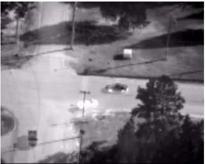 Figure 1.2: Frame of DARPA VIVID video of vehicle moving through intersection.