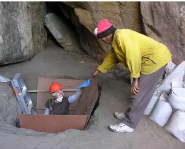 Figure 4 Sigrid excavating with local Ju/’hoansi headman Xontae Xhao.