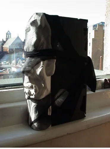 Fig. 46 Young-Gil Kim, Hostage, 2002, videotape, paper-clay, stocking, 6×15×20 