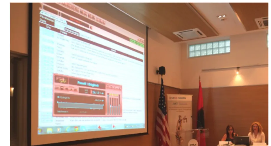 Figure 2. HCJ inspectors demonstrating how to access court audio records from the  Central Record Archive