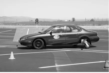 Figure 1. Sedan equipped with skid monster. 