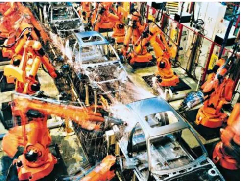 Figure 2.11: An assembly line using assembly robots to complete the welding of car  chassis