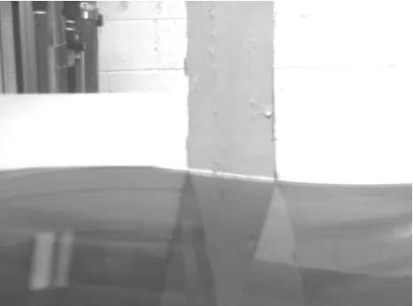 Fig. 2.Figure 2. Contact line image that contains tank wall supporting beam and the viewing window  Contact line image that contains tank wall supporting beamand the viewing window.