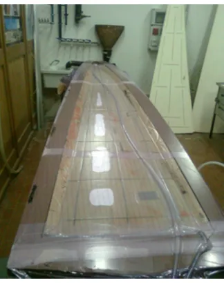 Figure 2.9: the parabolic sector placed in the mould and inserted in the plastic bag.