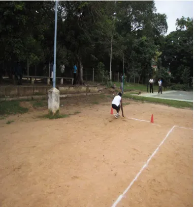 Fig.4.8 Subject picking up the wooden block 