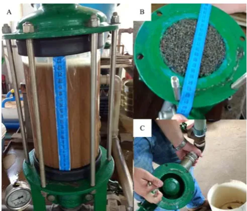 Figure 2  Sand filter prototype in operation, with details of the acrylic filter body (A), porous surface drainage system (B) and diffuser plate (C) 