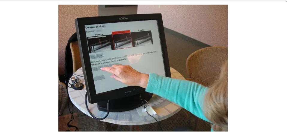 Figure 1 Touchscreen interface. A study participant interacting with the touchscreen to answer the questions accompanying each set ofanimations.