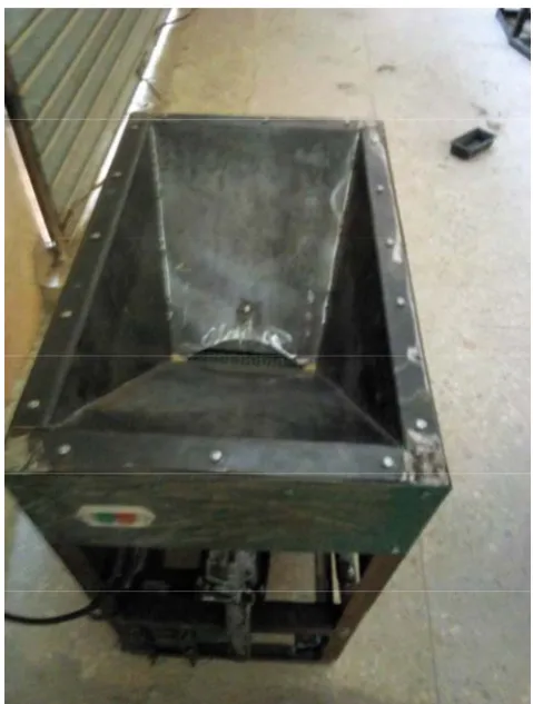 Figure 1  A 3–dimensional view of the motorized rice de-stoner 