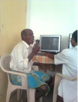 FIG:2- COMPUTERSIZED SPIROMETER WITH PATIENT