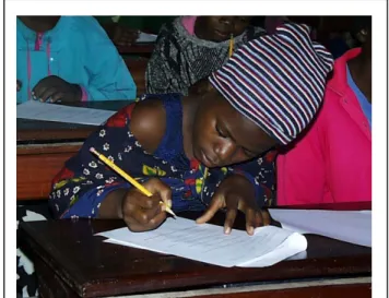 Figure 4 - Primary school student filling out one of the  questionnaires that was used in this study 