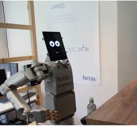 Fig 2. Bartending robot. The robot is shown at its bar about to grab a bottle of water for serving.
