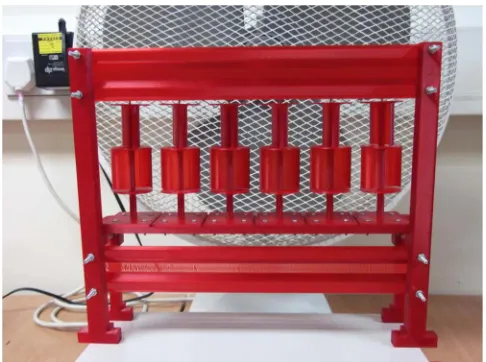 Figure 6. Experimental setup with six VAWTs. Frame width 275 mm, height 235 mm. Vertical support pillars 10 × 15 ×235 mm