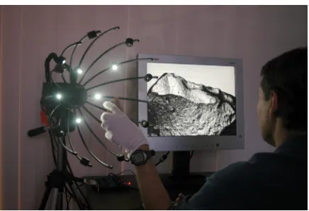 Figure 1. Our real-time system for inspecting objects with transformed surface reflection properties that are more conducive to perceiving shape detail