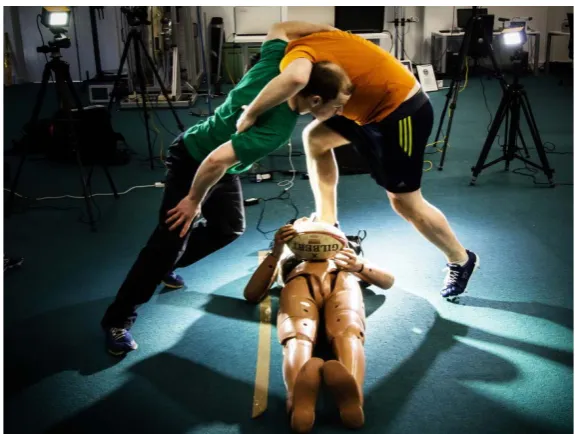 Figure 3: Two participants in a one-on-one rucking formation with the participant 