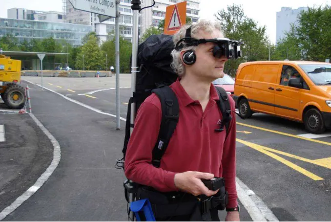 Fig. 1: lifeClipper2-user on walking tour in Basel. 