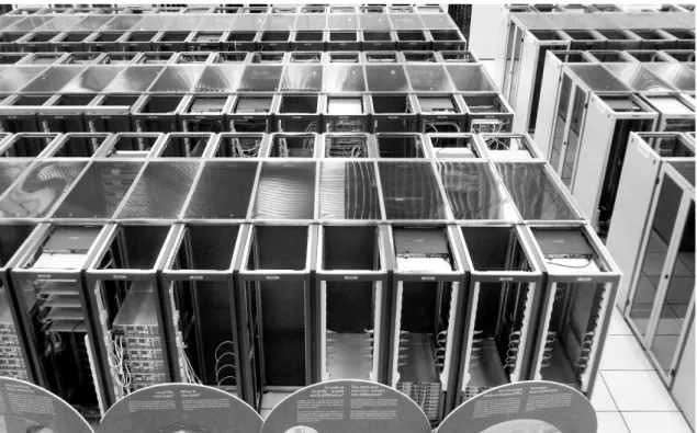 Figure 2.2: CERN computer centre. Some of the server racks are mostly empty because there is not enough cooling power to accommodate more computers.