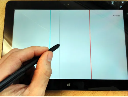 Fig 1. The line task in operation. The cyan target line is visible, along with a red distractor and the narrower, black stylus line.