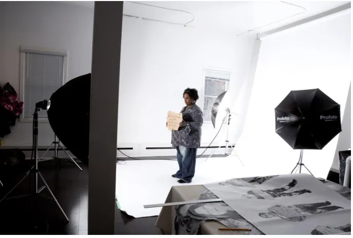 Figure 2.1: Photograph of Lisa Fischer posing for her photograph at Bergeron’s studio (Fauxreel Studios, Toronto, Ontario, 2009)