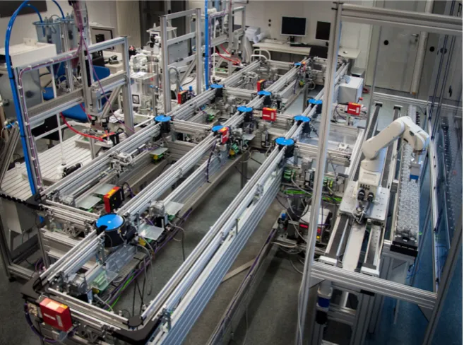 Figure 1. A demonstrator for complex manufacturing system in the chair of Automation and Information Systems, Technical University of Munich