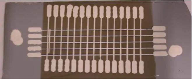 Figure 2. This picture shows a sample made onto a silicon substrate. The silicon surface shows as grey in the picture