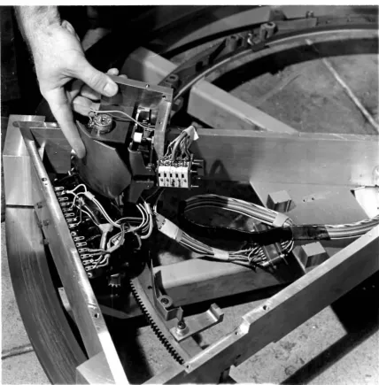 Figure 6 : The motorize d carriage with the l atching device partially removed. The lat ching yoke, potentiometer and the series of "position" switches are visib le