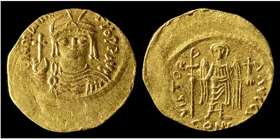 Figure 8. Gold coin (low, ancient graffiti below bust, 22 mm, 4.37 g. (Gabriel Vandevoort, URL http://www.ancientresources.comcross and globus cruciger, Victoria AVGGG officina letter I, CONOB be-Pt); Byzantine Empire, Maurice Tiberius, struck 583 AD, Cons