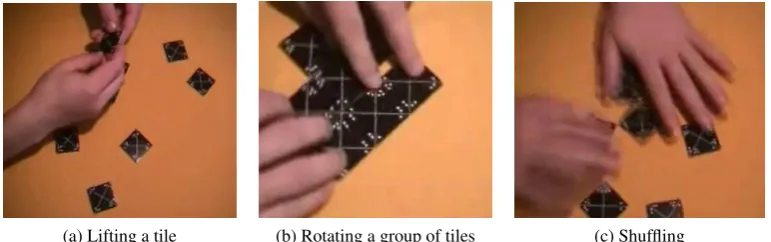 Figure 2: A person playing with the cardboard version of the puzzle.