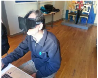 Fig. 4. A volunteer is wearing Oculus Rift while exploring the brain model at the Trondheim Science Centre