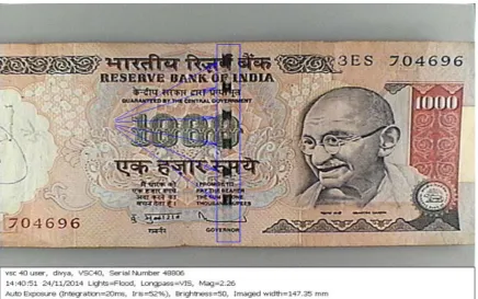 Figure 6:  Paper currency note Rs.1000 showing red color security thread in visible light