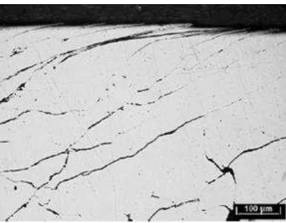 Figure 12. Subsurface micrographs of the Stellite 12 RCF samples: a) 1 layer sample after 50,000 cycles in the etched condition, b) 2 layer sample 