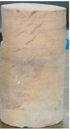 Figure 2. A baked clay cylinder is being cut with core cutter machine. 