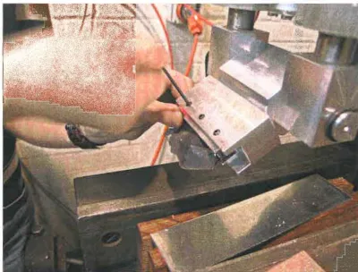 Figure 9. Adjusting the rotatable head to obtain desired relief angle. 