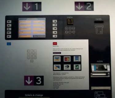 Figure 1: The ticket vending machine. The screen (diagonal 25cm, underneath the 1  arrow) is at eye level fora standing adult, its centre 1.47m off the ground