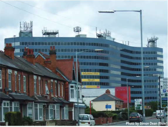 Fig. 1.1: Colocation of six base stations on one roof top. Birmingham, UK.