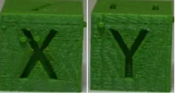 Figure 9. Blobs on surface of XYZ Calibration Cube printed on cloud-based controller with large delays primarily caused by low computational resources on a Google Compute Engine stationed in Sydney, Australia