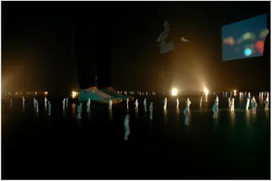 Figure 3: If anyone wonders why rocks breakdown; audience wearing headphones, navigating the space and video