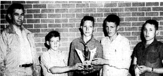 FIGURE 2. A On a sepa*rate whether typical judging contest. Boys must identify plants, determine they are perennial or annual, cool or warm season and native or introduced