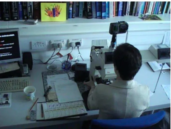 Figure 1: Still from video camera of one of the participants during a reporting session 