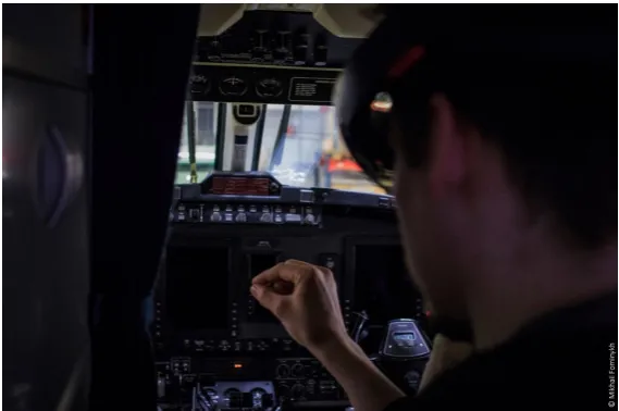 Figure 6. Maintenance Engineer in the cockpit of a Beechcraft B200 King Air model. Image: MikhailFominykh, WEKIT consortium (2017).