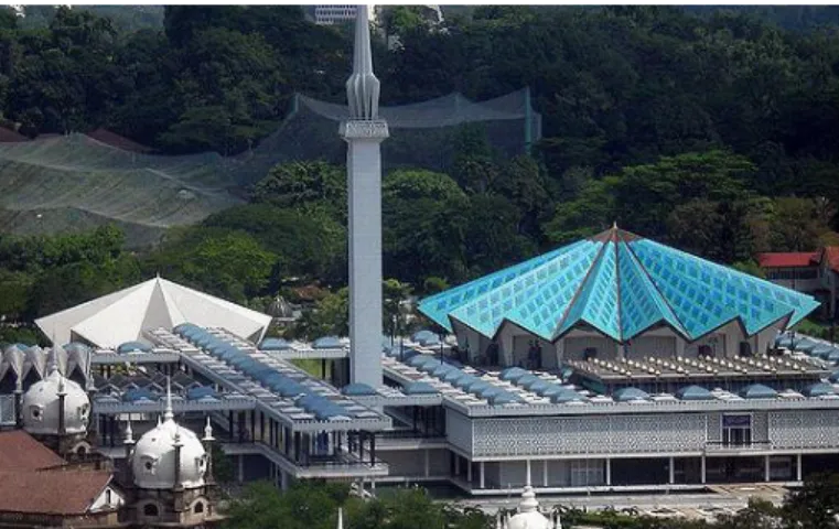 Figure 2 National Mosque or Masjid Negara, completed in 1965 is the larger structure  with patterned roof on the right while the smaller building with similar roof structure on 