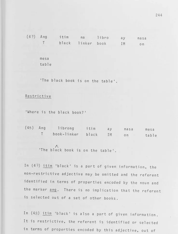 table 'The black book 1s on the table'. 