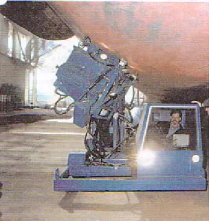 Figure 7  presents a standard electric Car Jack currently available in the market.  Three main problems are  discovered when operating this Car Jack: (1) unstable footing, (2) limited lifting space, and (3) difficulty  in locating the lift position