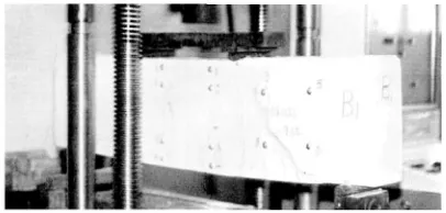 Figure 4 A typical test beam reinforced with EWF during testing.