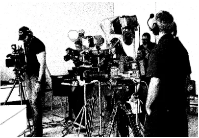 Figure 3. Students learning about the television equipment Shaw Cable provided for the television shoot