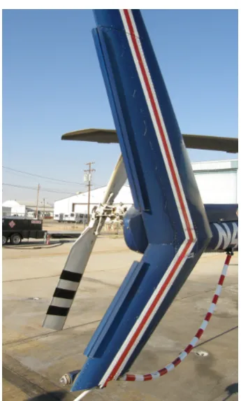 Figure 1.6: Double Gurney ﬂaps on a Bell 222U helicopter vertical stabiliser (wikipedia).