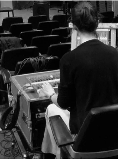 Figure 4. M2 in rehearsal. The console rests upon a flightcase containing Motu24i/o hardwired to XLR patchbay,Atomic, Midi interface and rack-mount PC running bothclient and server.